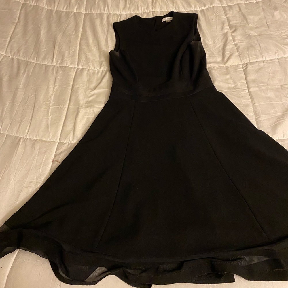 Short, black, sleeveless dress from Calvin Klein. Size 2.